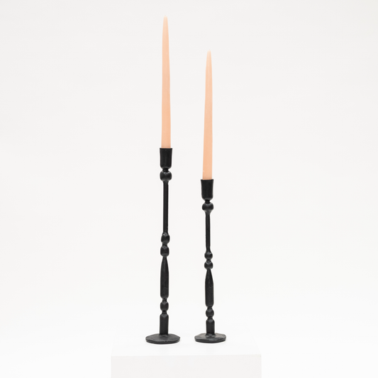 thin iron candlestick with spheres