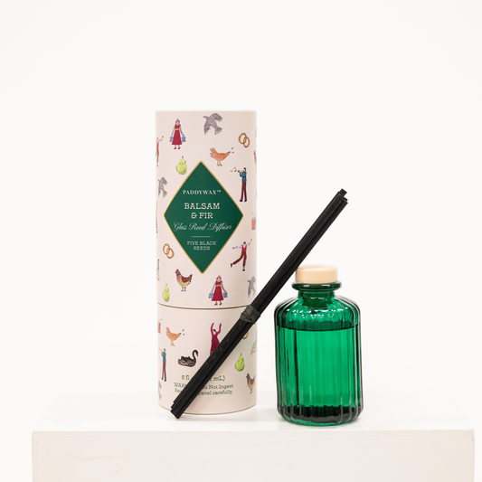 green diffuser with woodsy scent christmas scent
