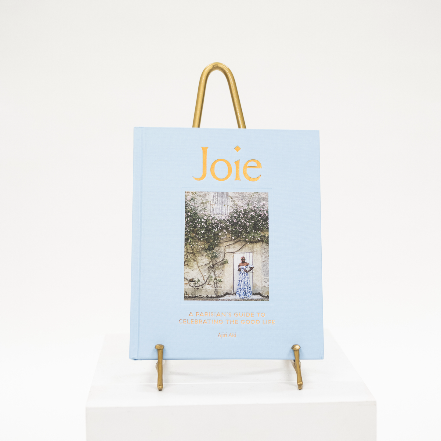 joie blue linen coffee table book about parisian lifestyle