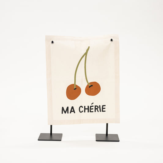 Wall canvas sign with phrase ma cherie and a pair of hand drawn cherries