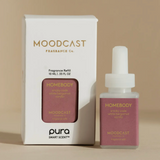 Moodcast Fragrance Co. Homebody fragrance refill set, featuring a white box and a white dropper bottle with a dusty rose label, on a warm beige background.