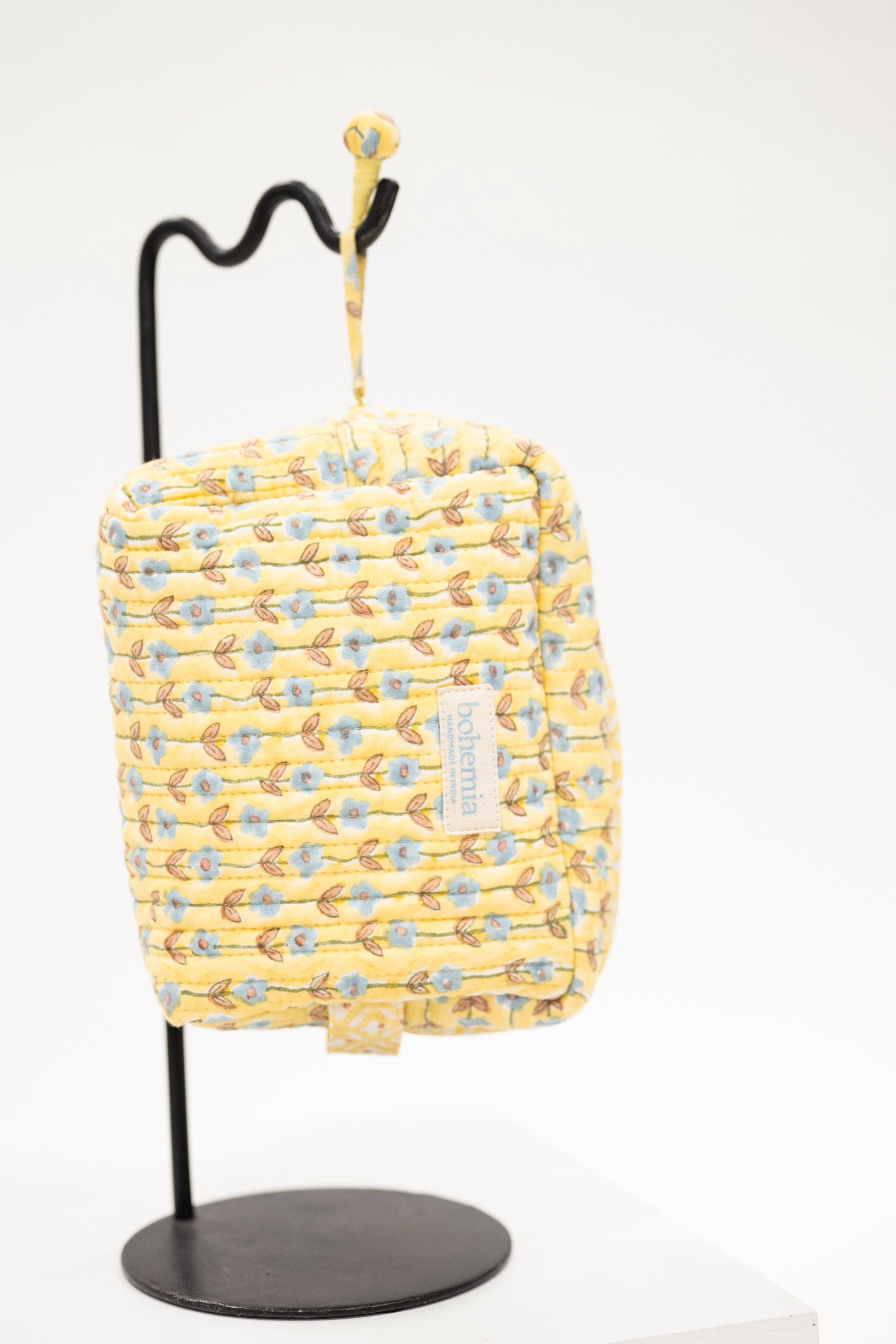 yellow block print quilted travel makeup bag with waterproof liner