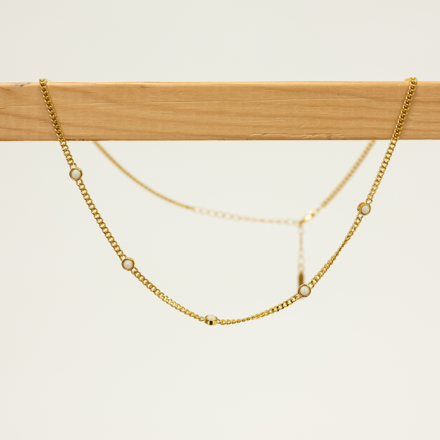 White Opal Necklace 18k Gold Plated On Wooden Hanger and White Background