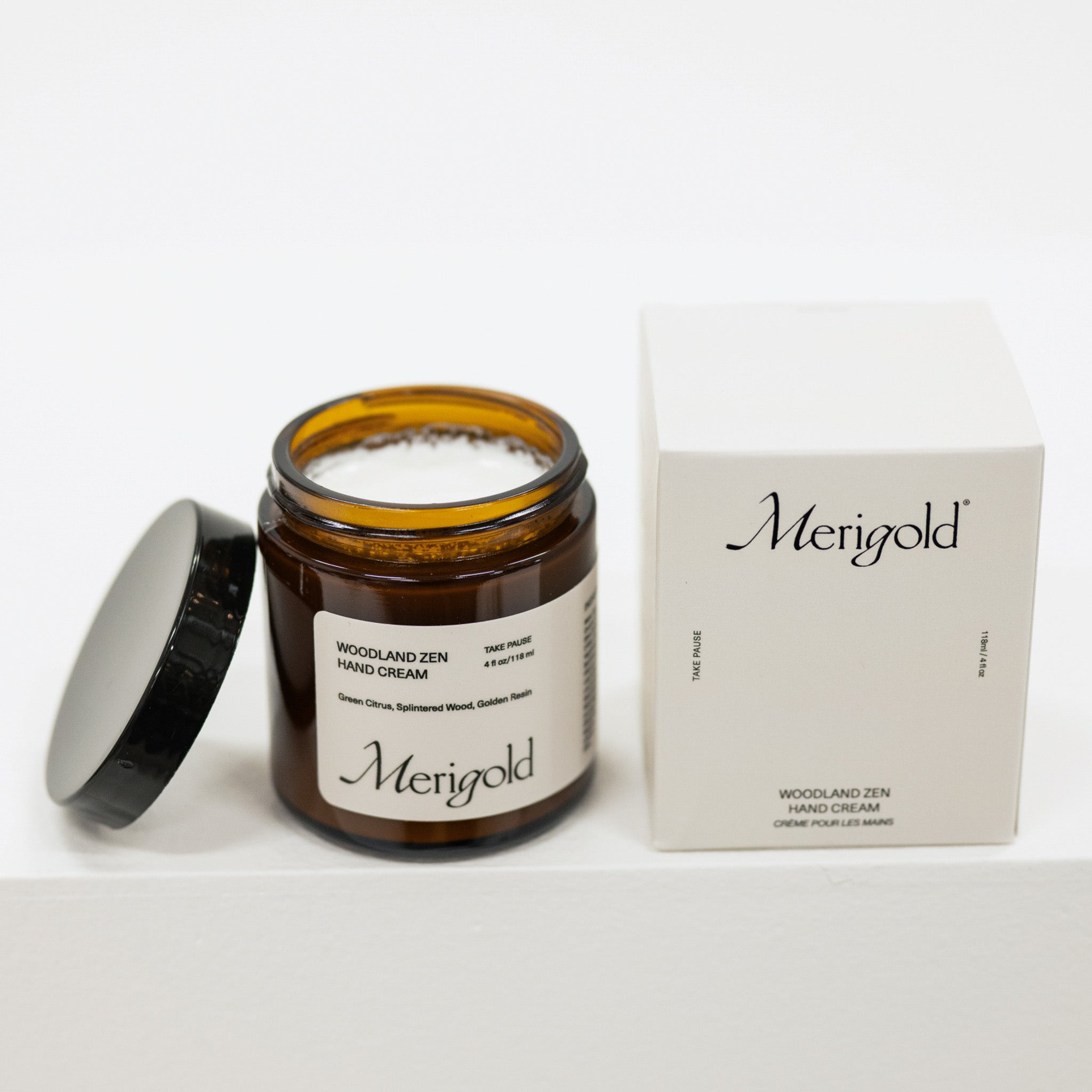 Jar of Merigold Woodland Zen hand cream with a box on a white background