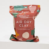 Bag of Breathe People air dry clay on a white background