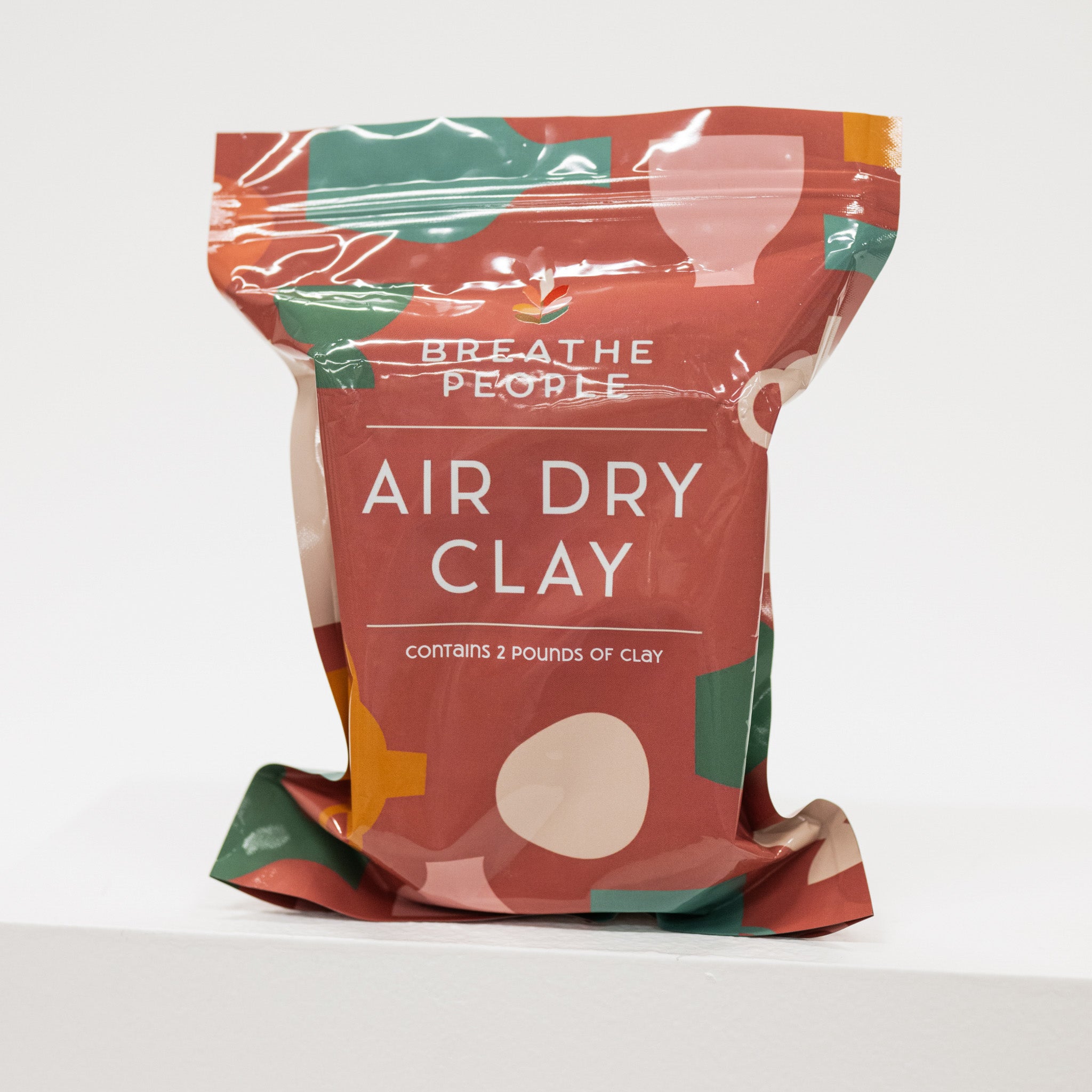 Bag of Breathe People air dry clay on a white background