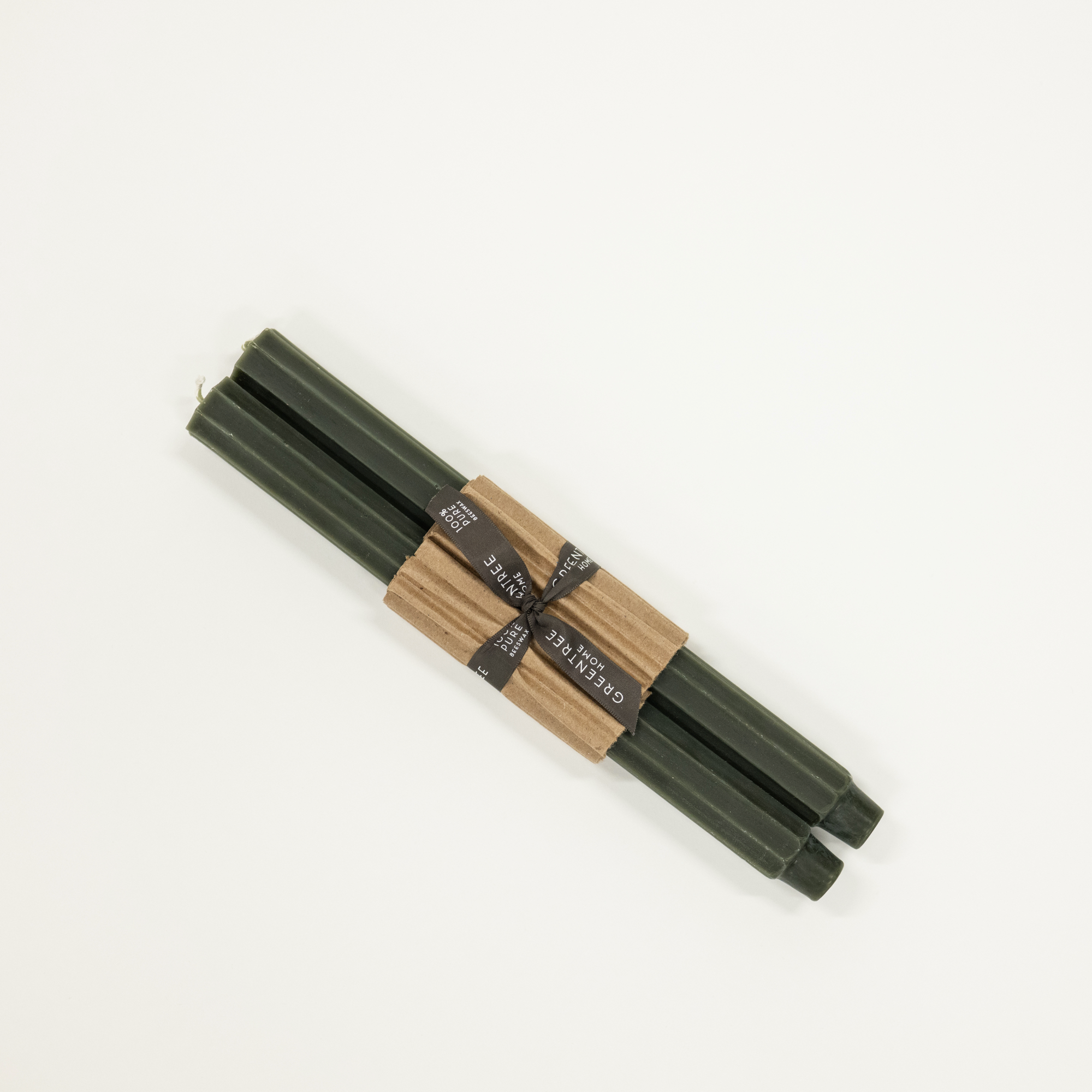 dark green candle taper with fluted pattern