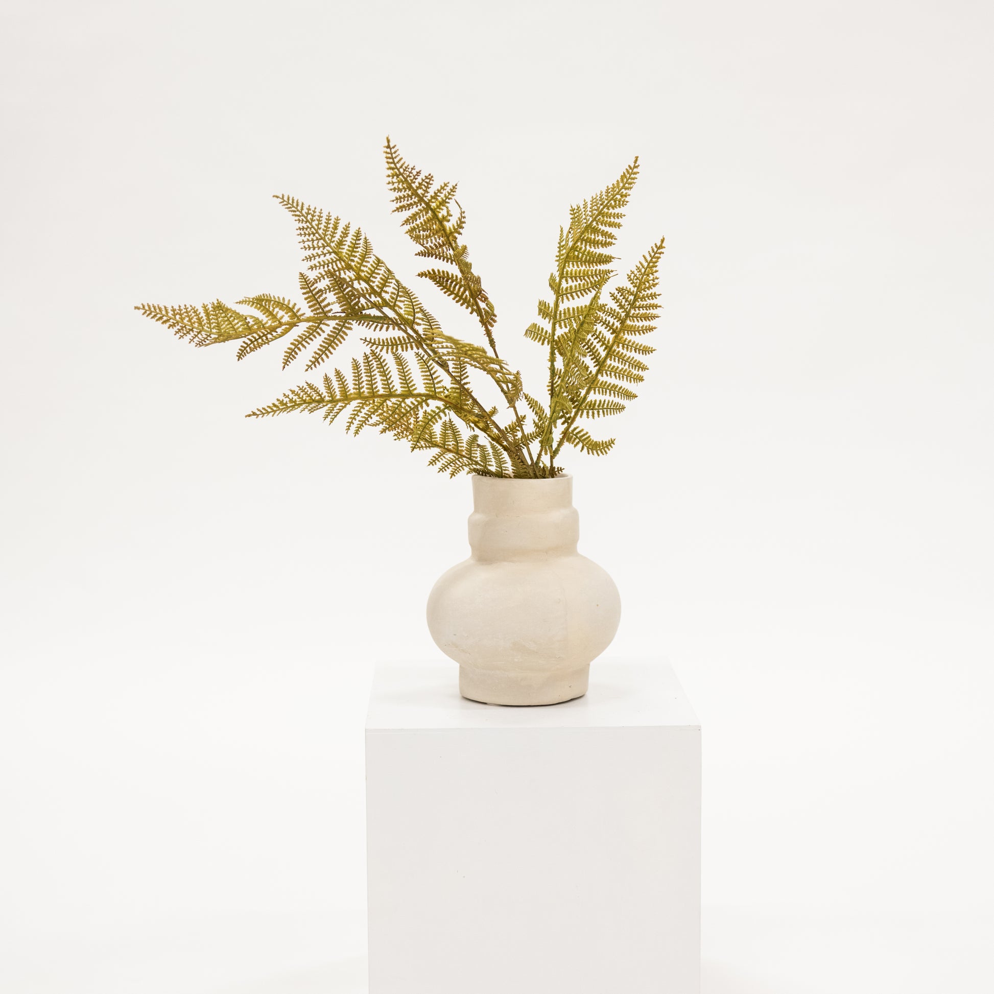 faux autumn fern stem with shades of greens, yellow and orange