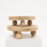 Light Wood Riser With Ball Feet