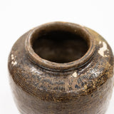 Detail look inside a brown vintage pot