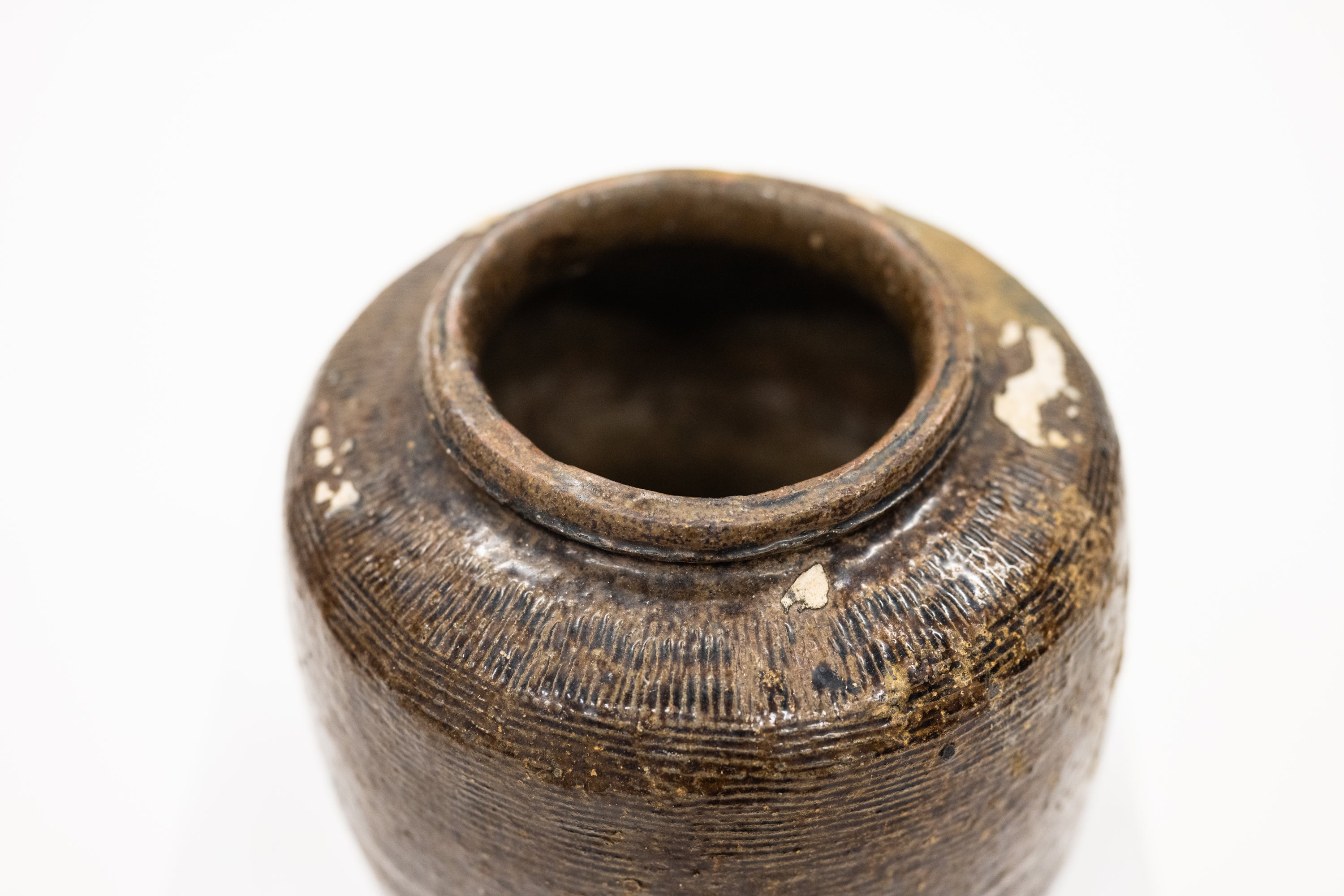 Detail look inside a brown vintage pot