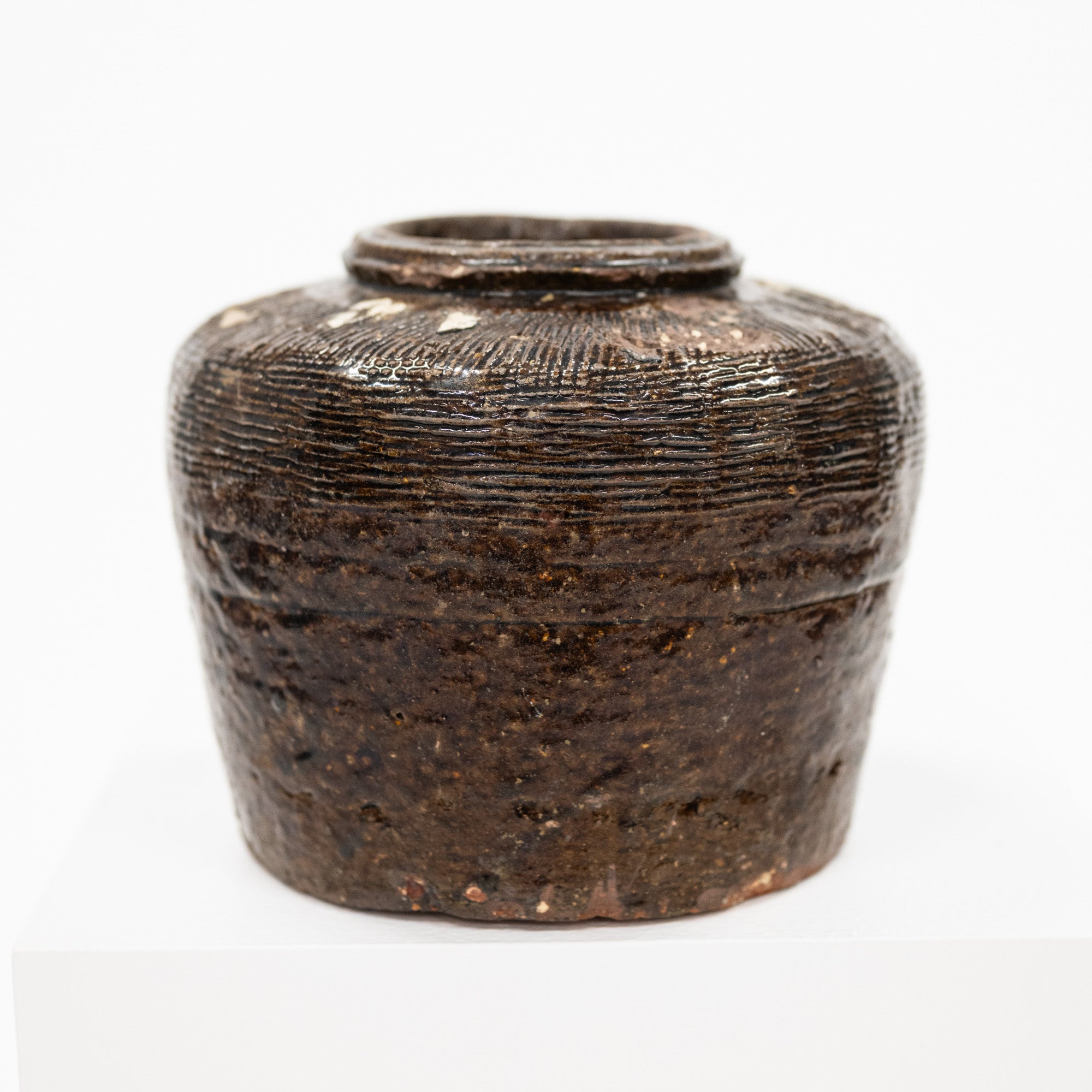 detailed side view of a vintage bean pot