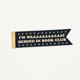 Decorative banner with text 'I'm WAAAAAAAAAY behind in book club' on a white background