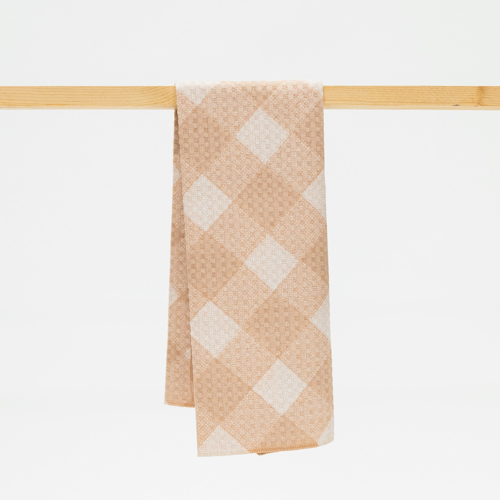 beige and cream plaid pattern on kitchen towel