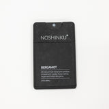 Noshinku Bergamot hand sanitizer in a black rectangular refillable bottle with white text, shown on a plain white background.