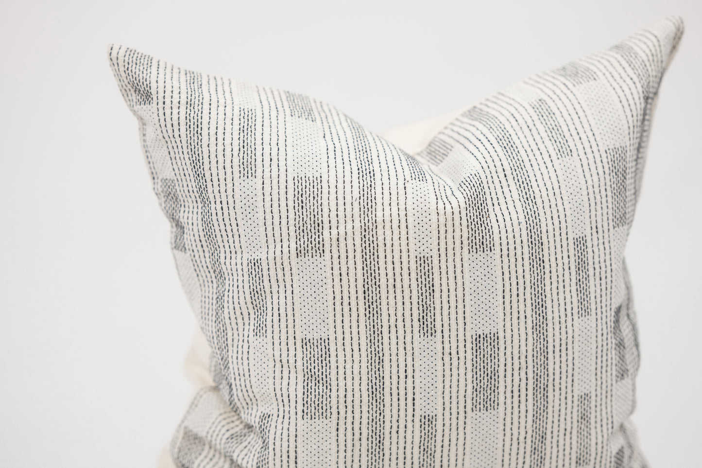 White and Black Stitched Pillow