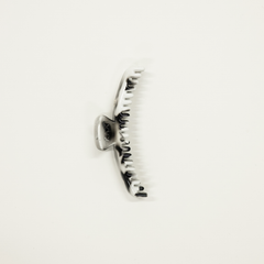 black white shiny colored midi sized kaxi hold everything hair claw