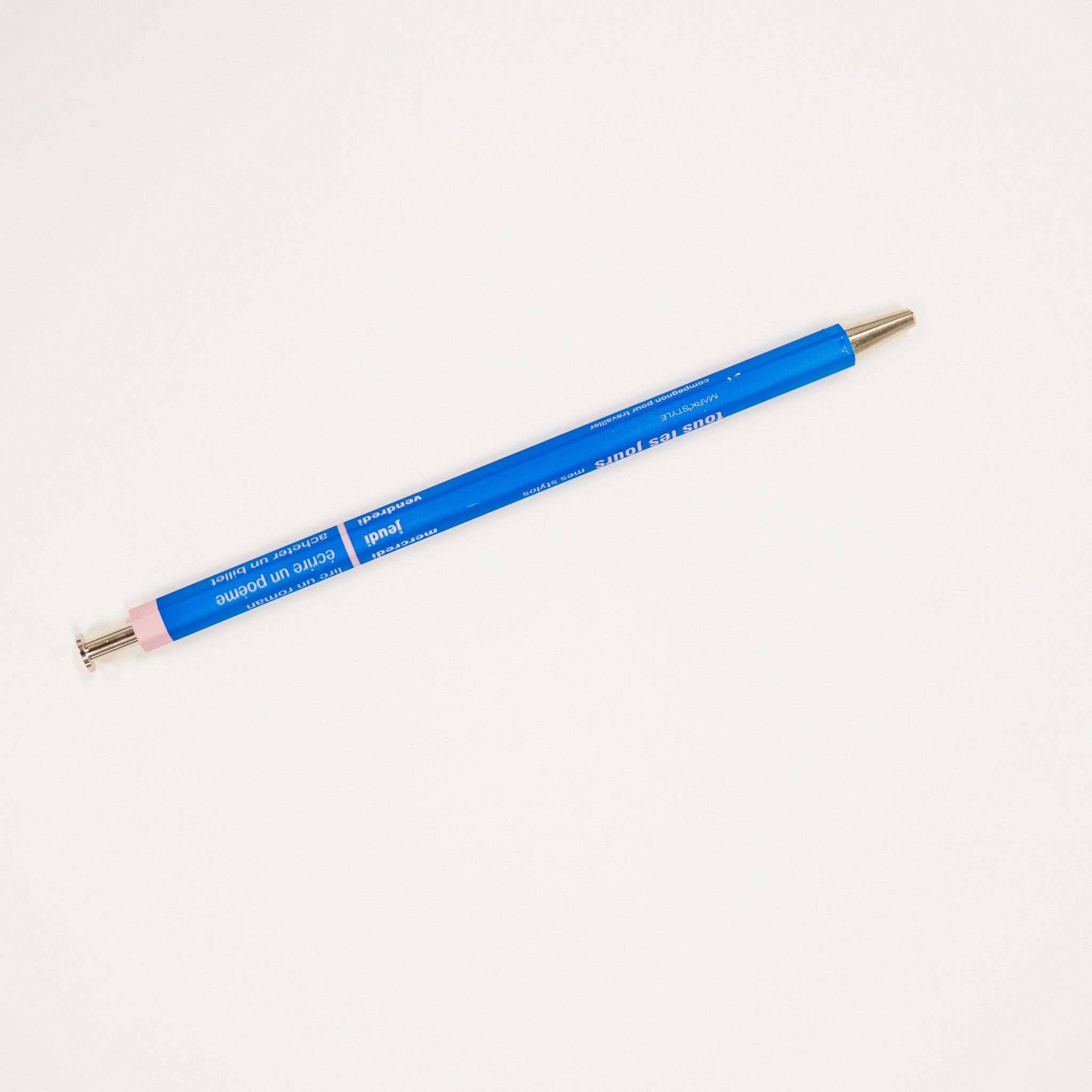 Blue pen with gold accents on a white background
