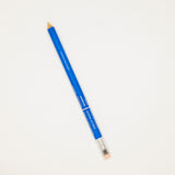 Blue colored pencil on a white background
