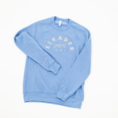 Perrywinkle blue colored crew sweatshirt with embroidered elkader iowa