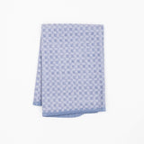 A folded light blue and white checkered microfiber dishcloth, displayed on a clean white background.