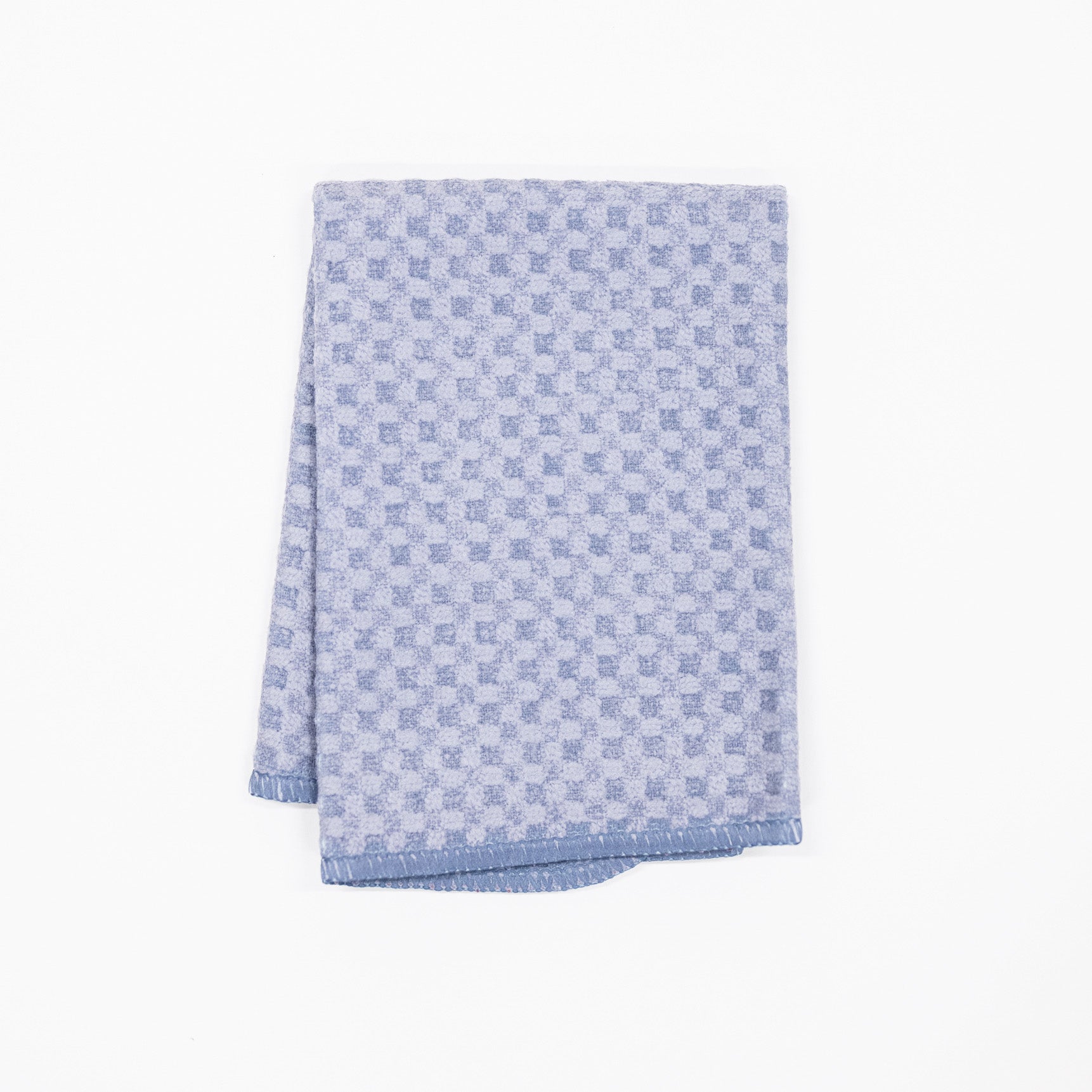 A folded light blue and white checkered microfiber dishcloth, displayed on a clean white background.