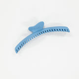 Blue comb on a white background