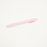 Pink pen on a white background