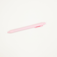 Pink pen on a white background