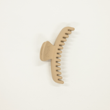 bone matte colored mini sized kaxi hold everything hair claw
