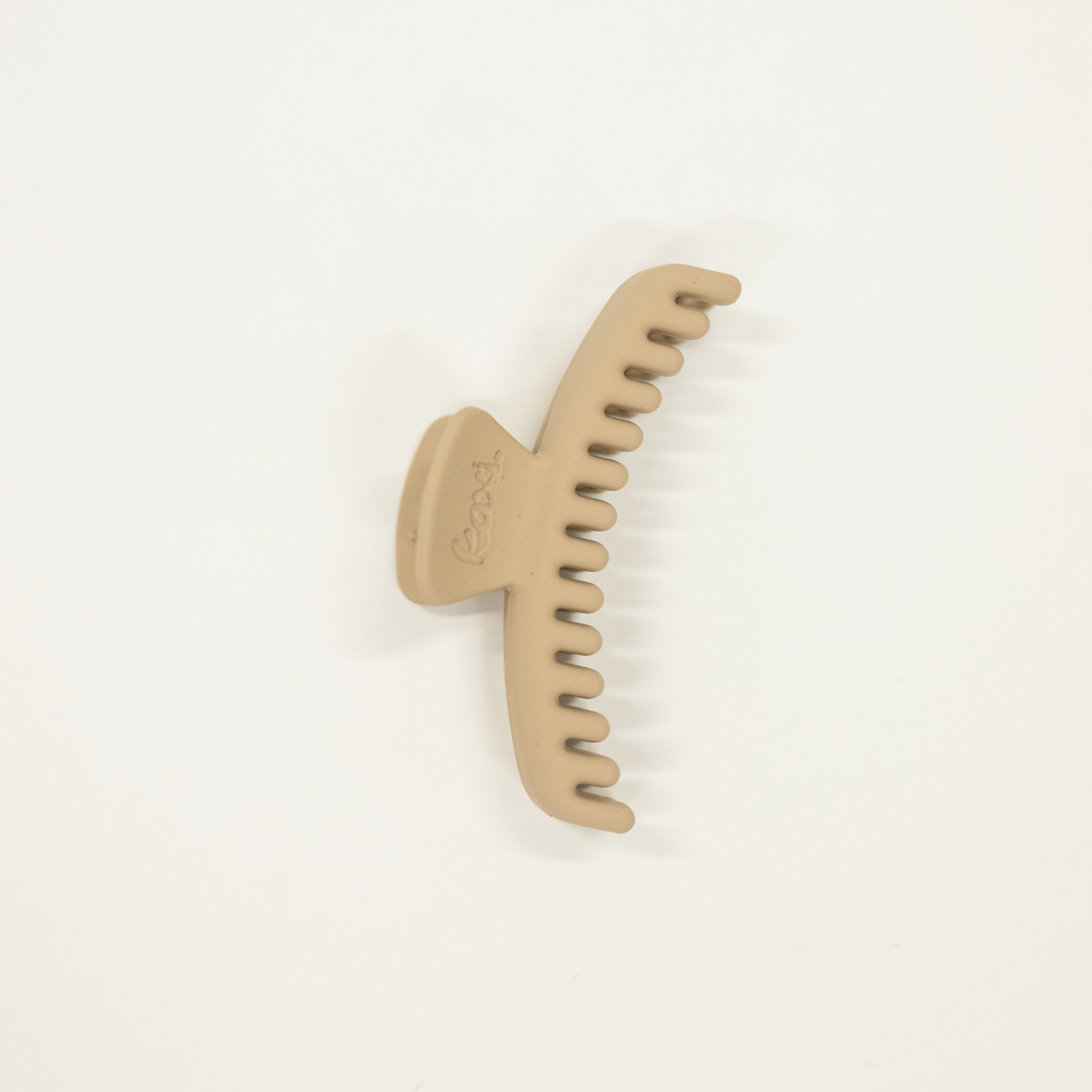 bone matte colored mini sized kaxi hold everything hair claw