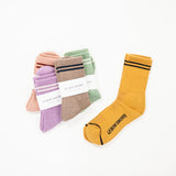 assortment of colors for boyfriend style socks by le bon shoppe