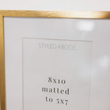 brass metal frame and white mat in size 8x10