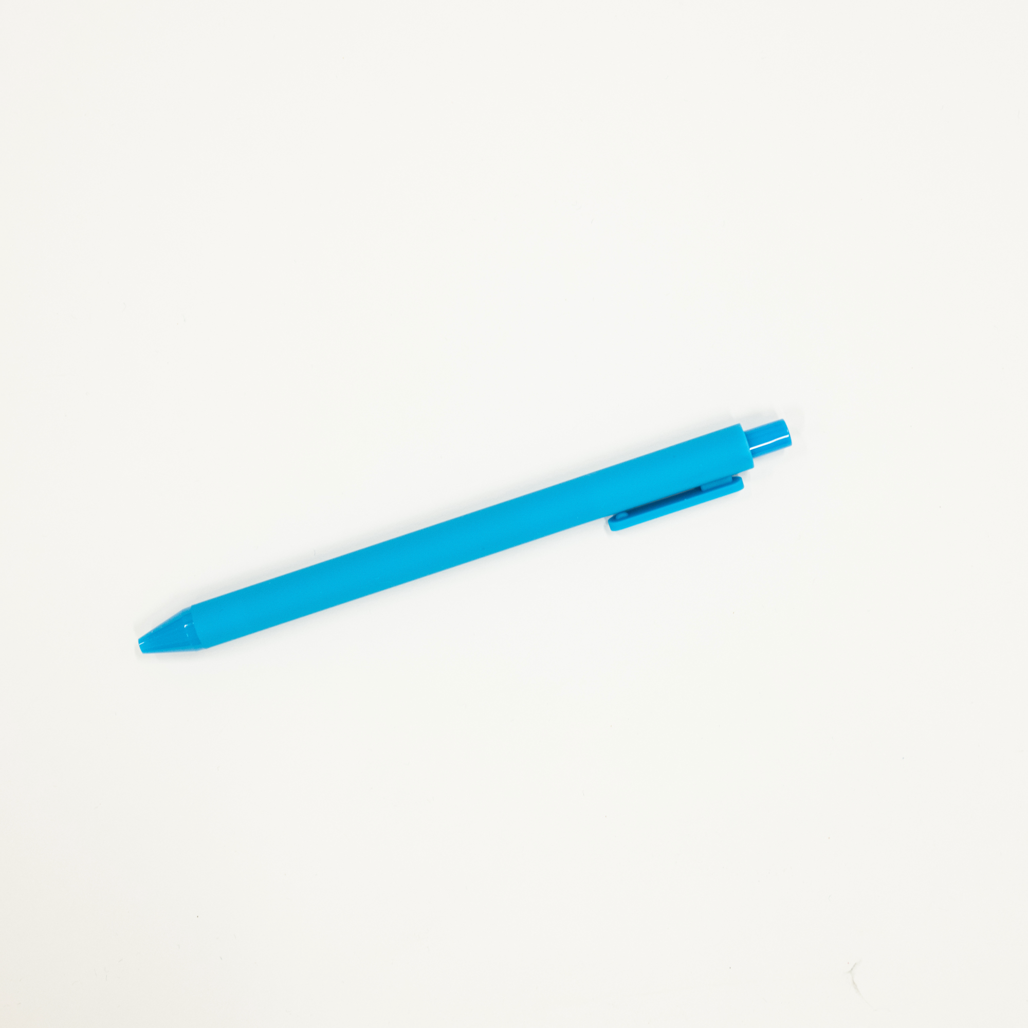 Blue pen on a white background