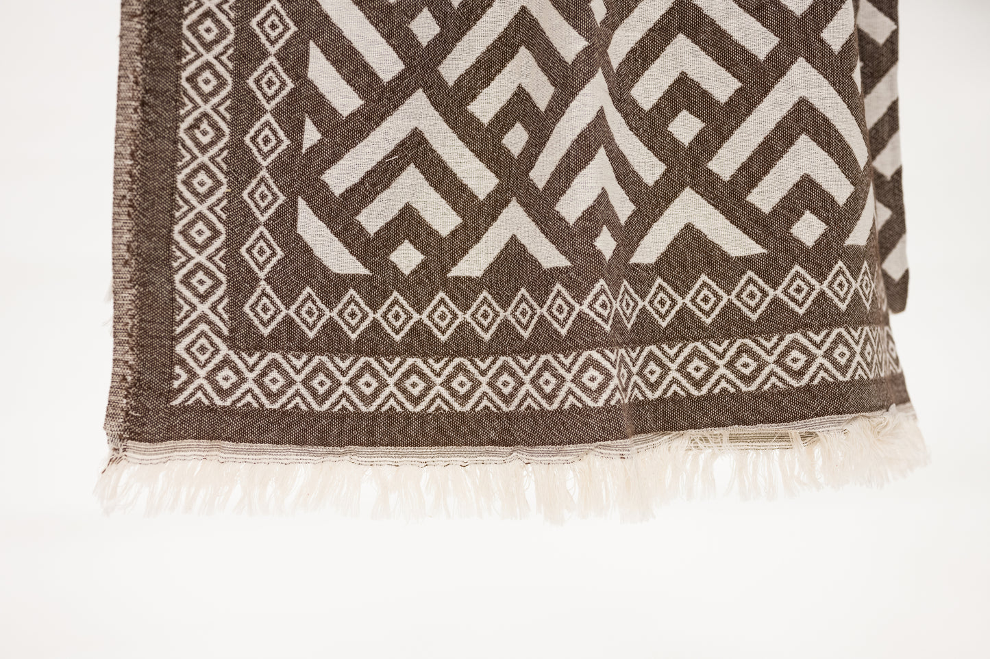 soft brown and cream diamond pattern throw blanket