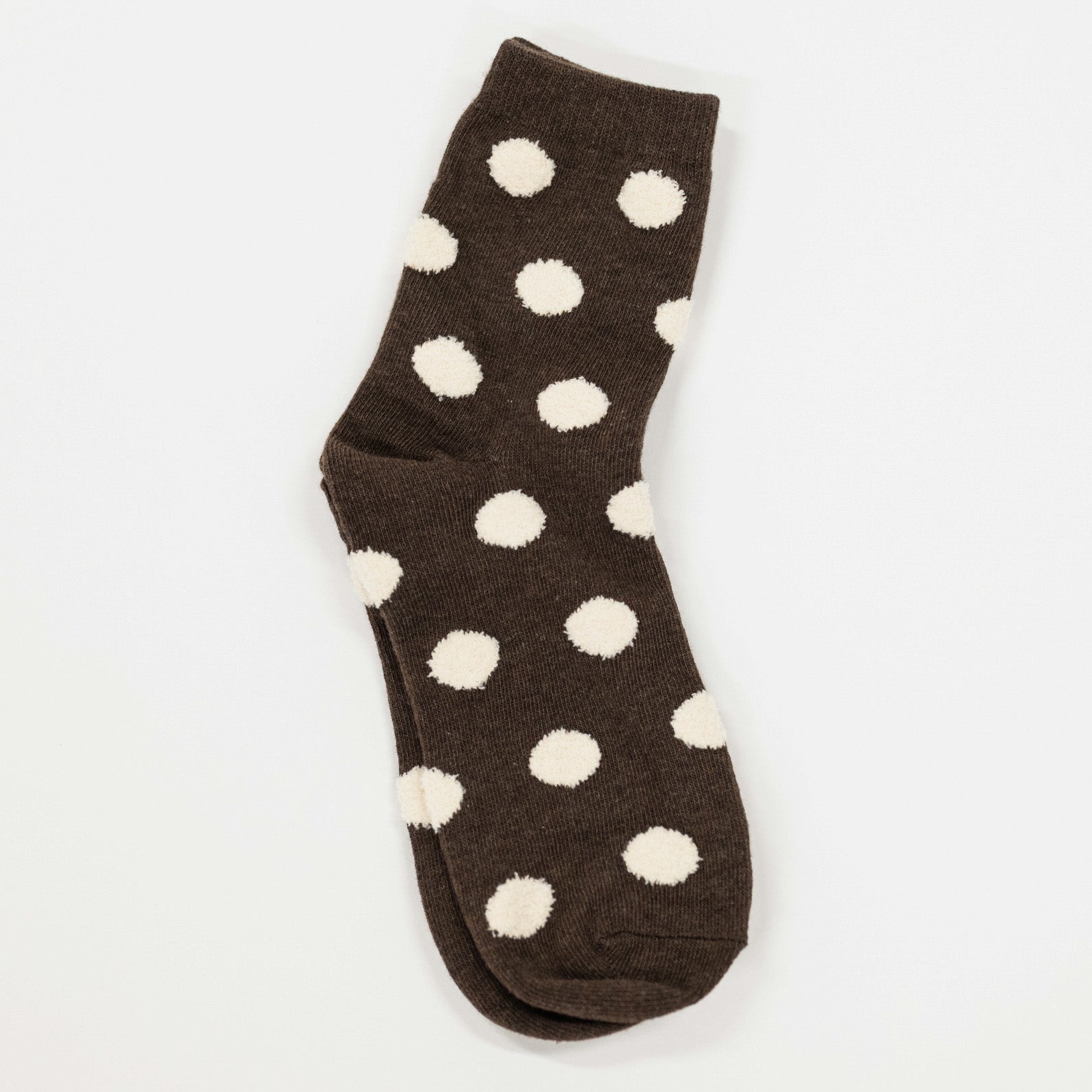 brown colored socks with puff raised white dots
