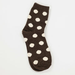 brown colored socks with puff raised white dots