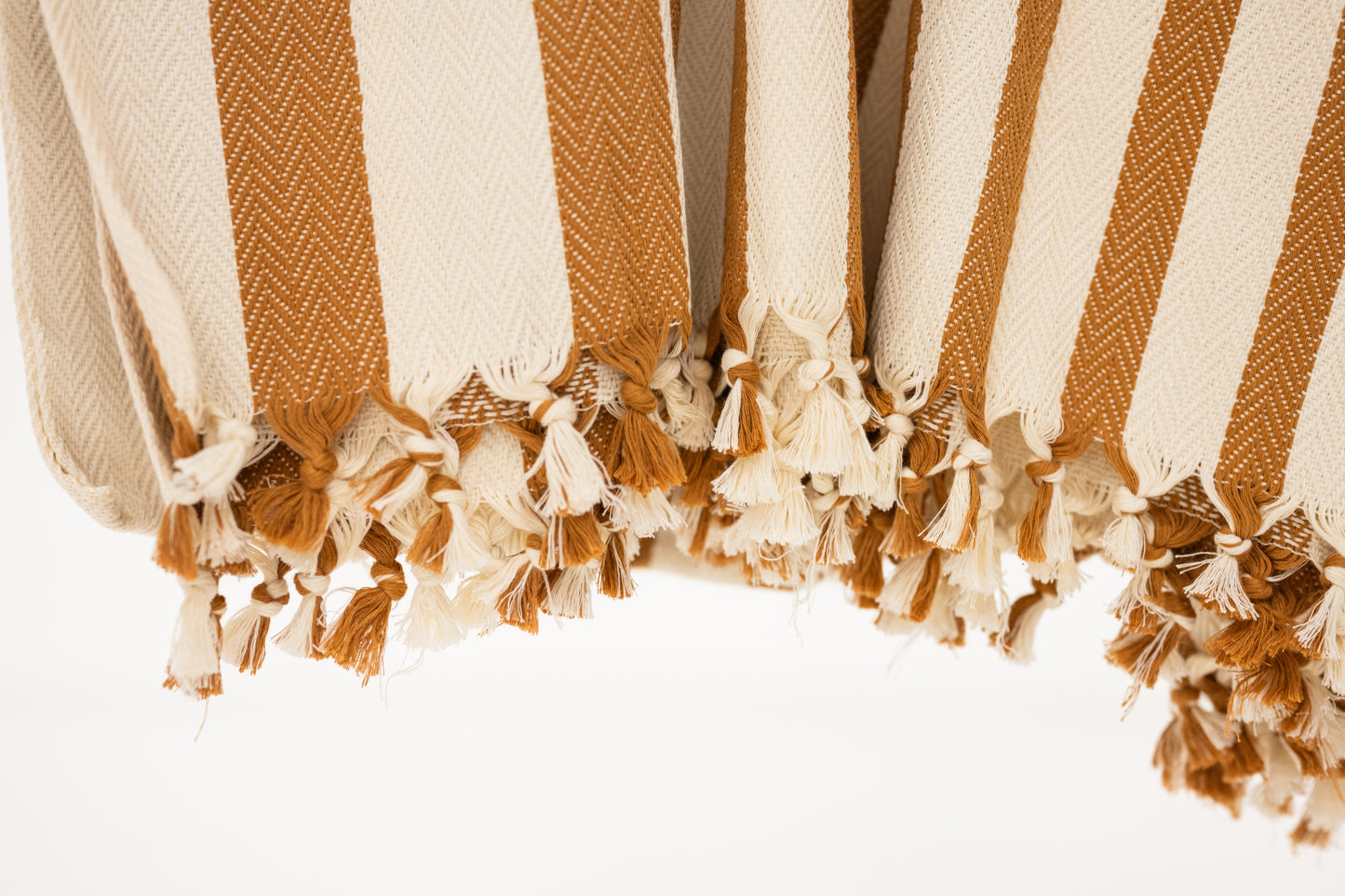 caramel brown and cream striped turkish blanket for the bed with tassels