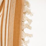 caramel brown and cream striped turkish blanket for the bed with tassels