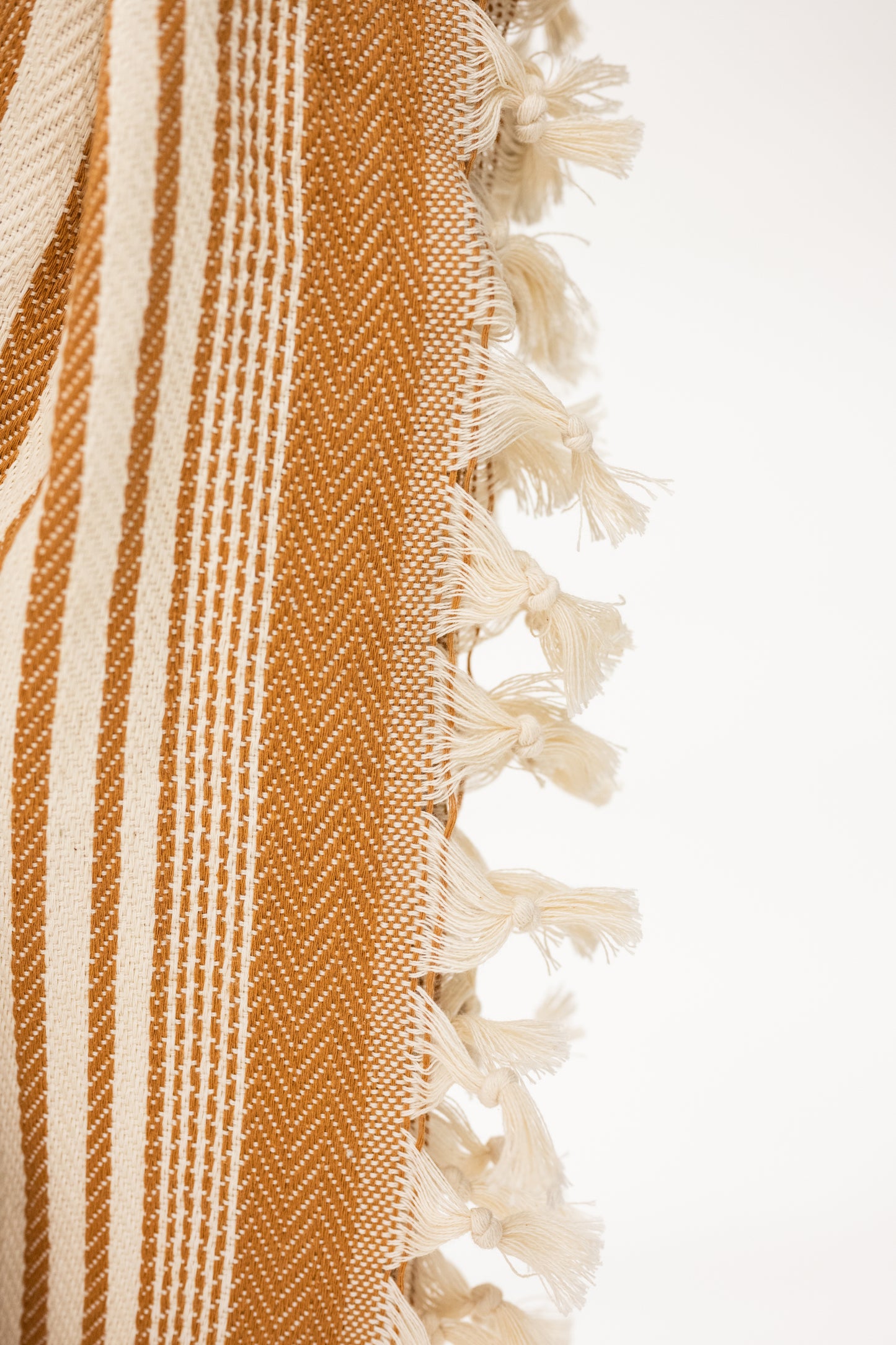 caramel brown and cream striped turkish blanket for the bed with tassels