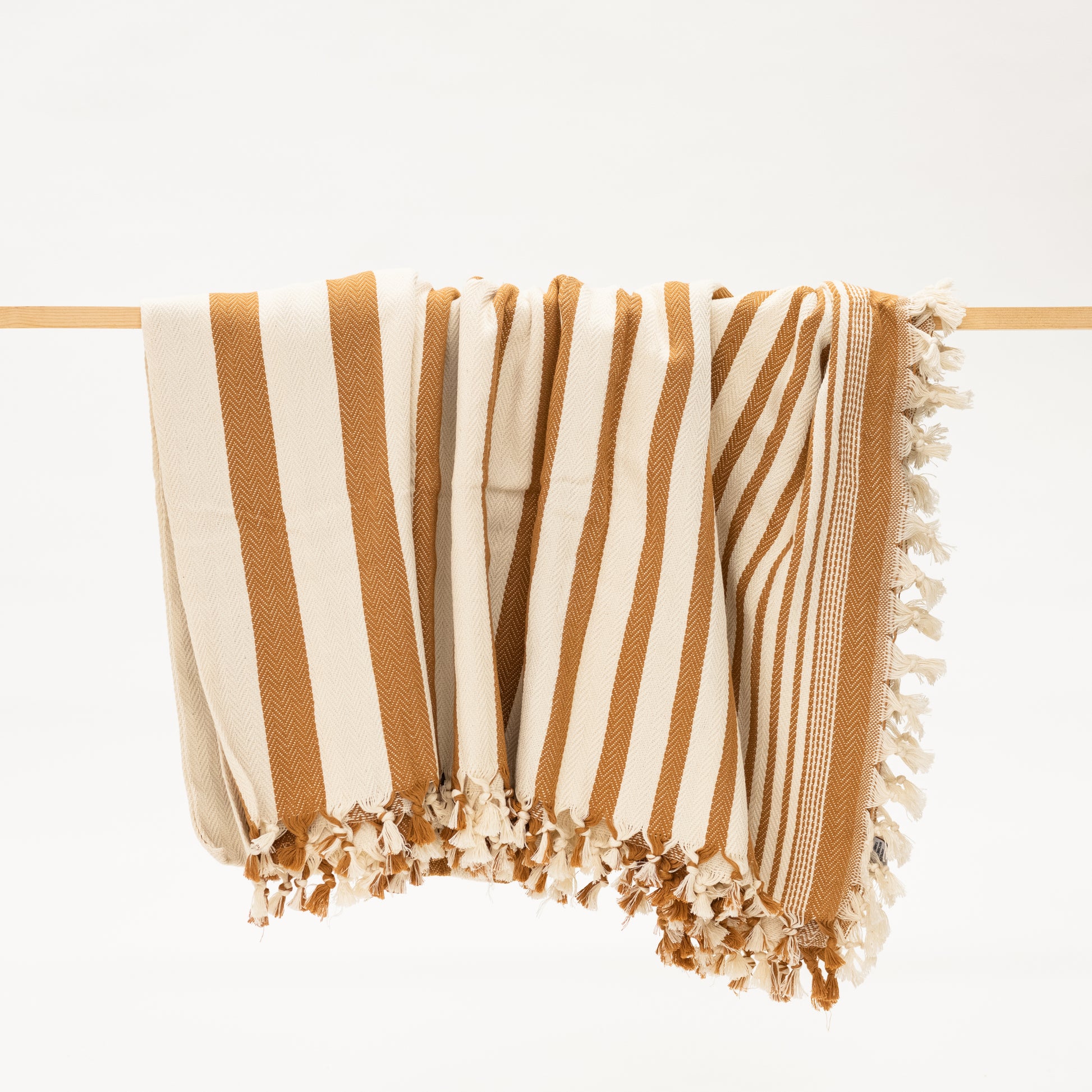 caramel brown and cream striped turkish blanket for the bed with tassels