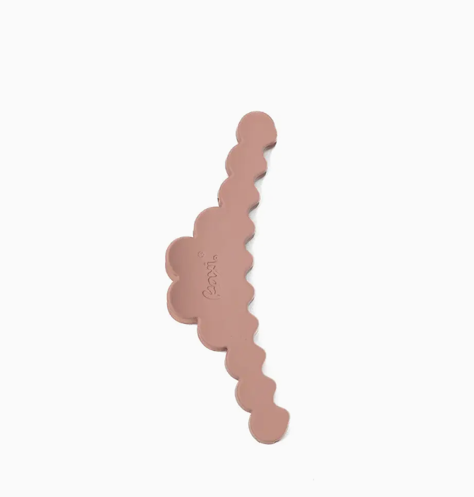 A dusty rose hair claw clip with a scalloped edge, shown on a plain white background.