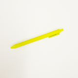 Yellow pen on a white background