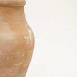 Brown ceramic jar on a white background