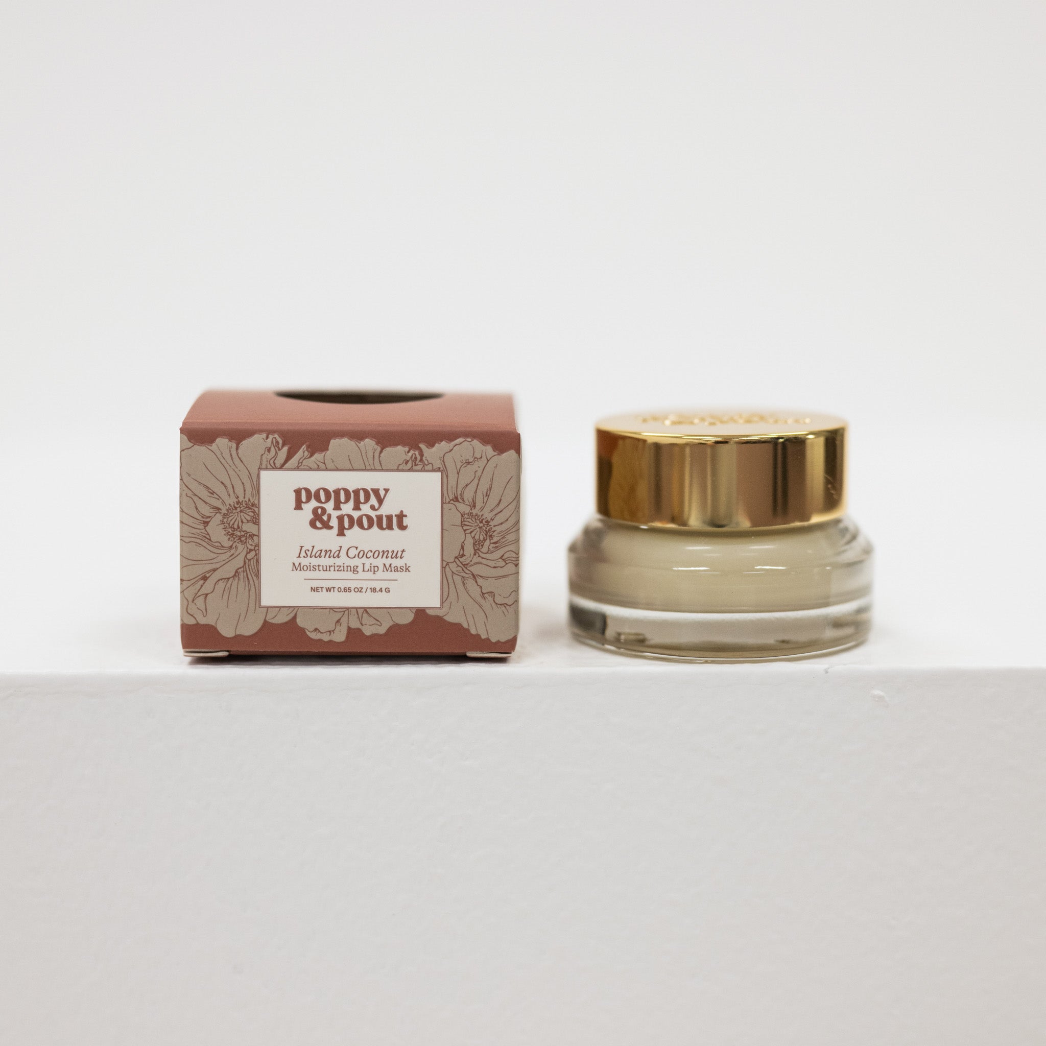Poppy & Pout lip mask jar and packaging on a white background