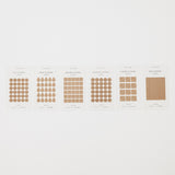 Set of brown sticker samples on a white background