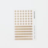 Set of light brown raised stickers and round discs on a white background with 'Cloth & Paper' branding.
