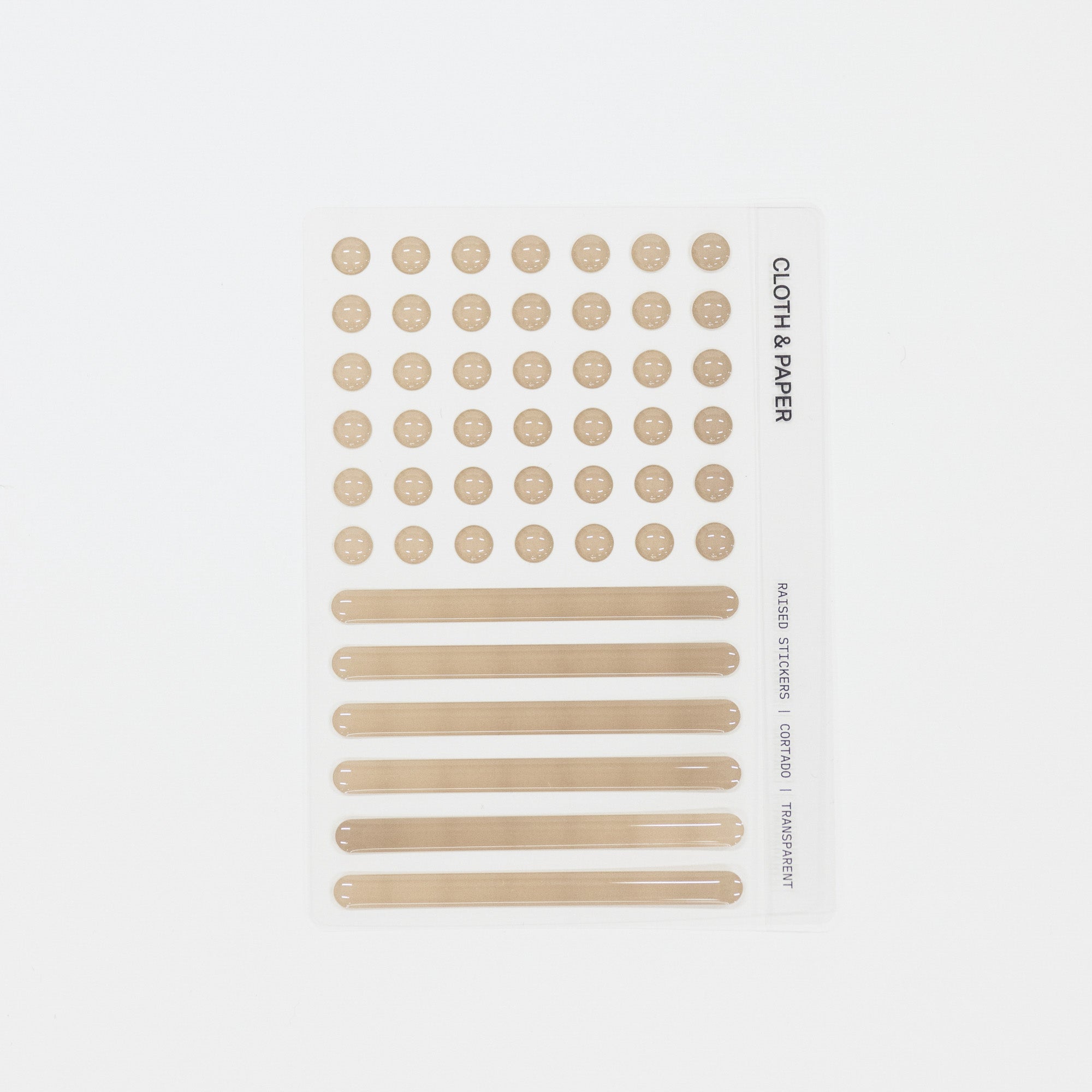 Set of light brown raised stickers and round discs on a white background with 'Cloth & Paper' branding.