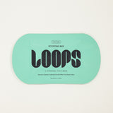 Loops detoxifying mask packaging on a light gray background