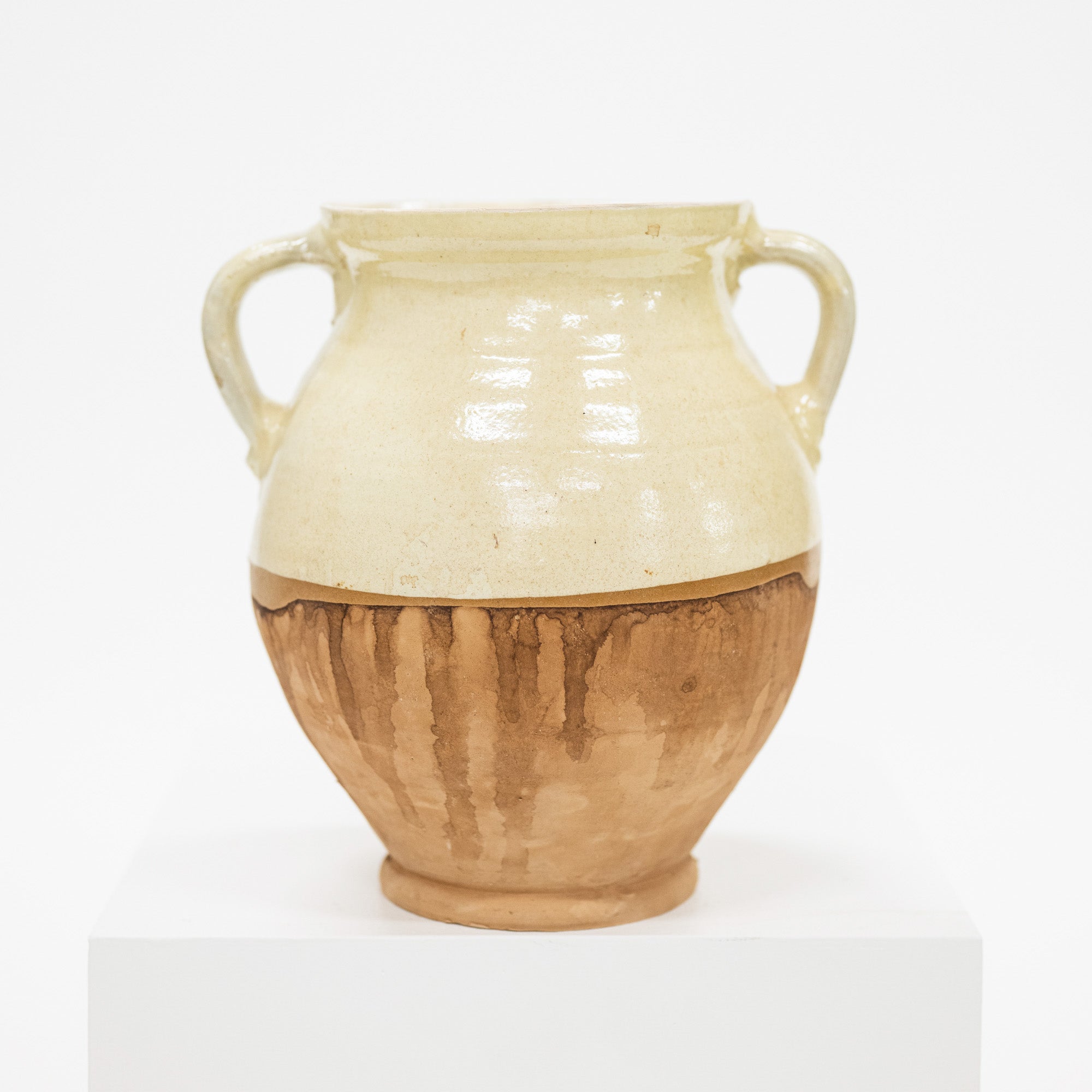 A two handled cottage vase with cream